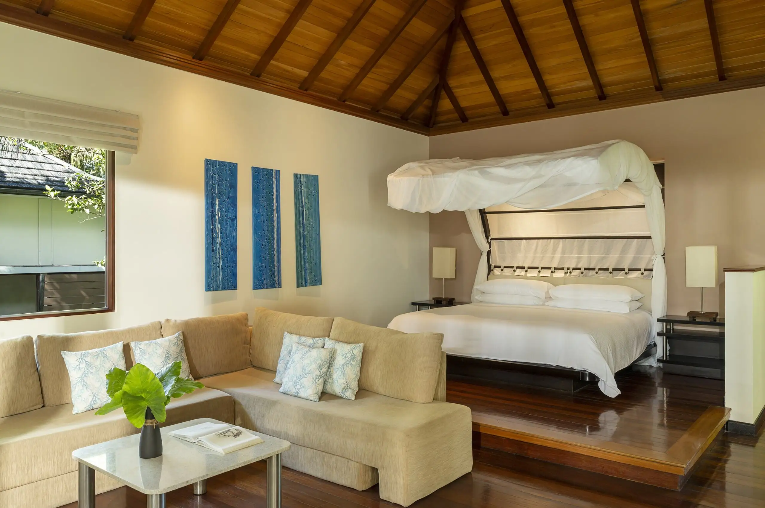 niva labriz seychelles jungle sanctuary pool villa bedroom with king bed and lush jungle view