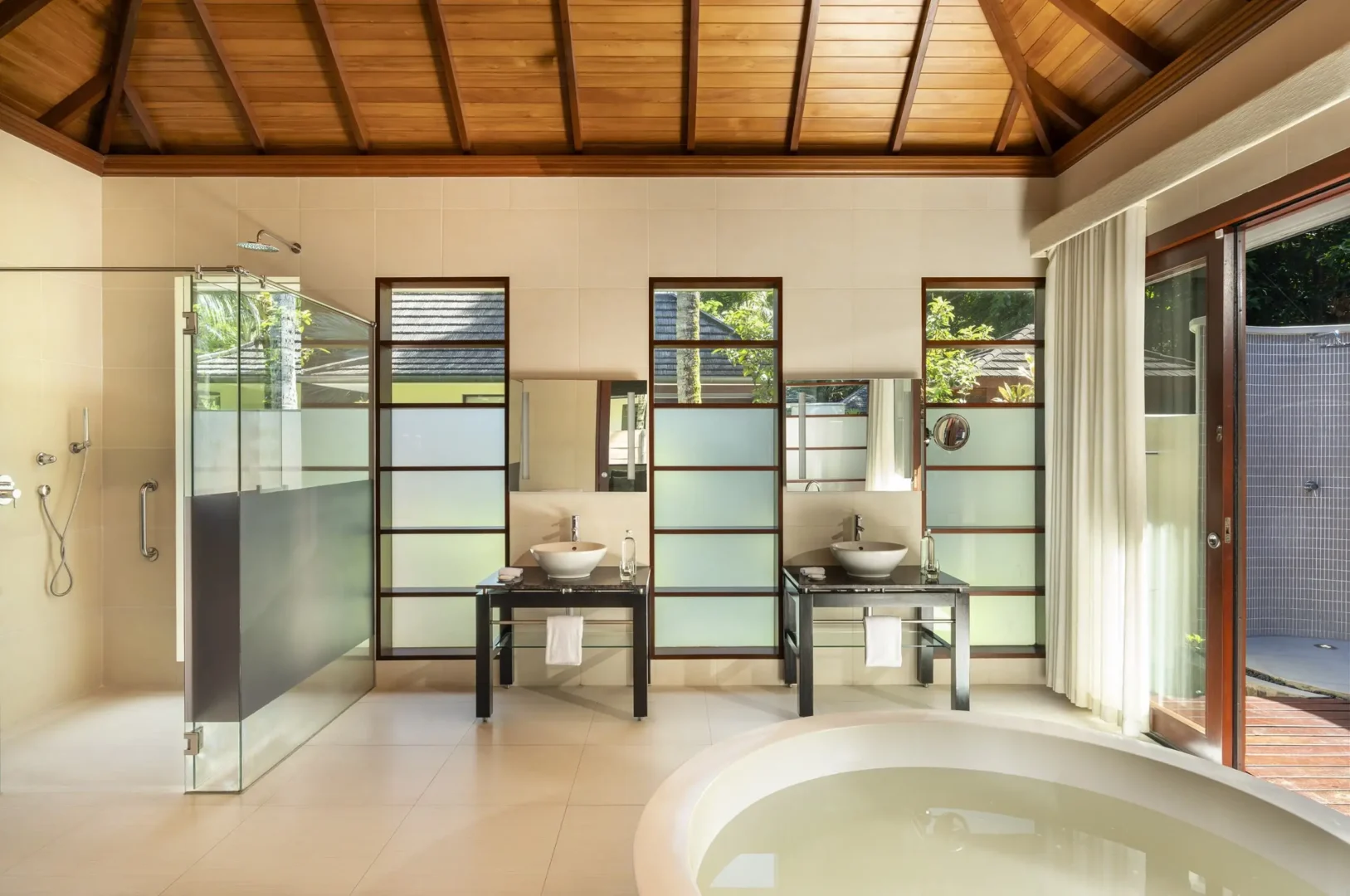 niva labriz seychelles jungle sanctuary pool villa bathroom sinks with modern design and tropical surroundings