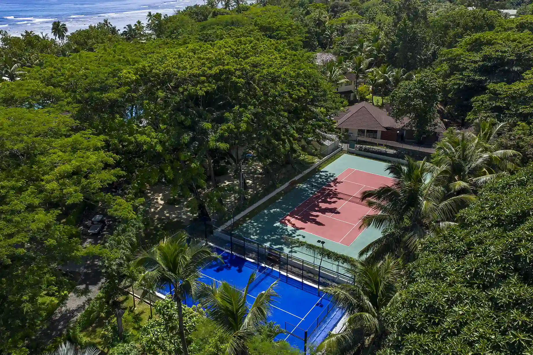 niva labriz seychelles land sports activities with tennis courts and greenery