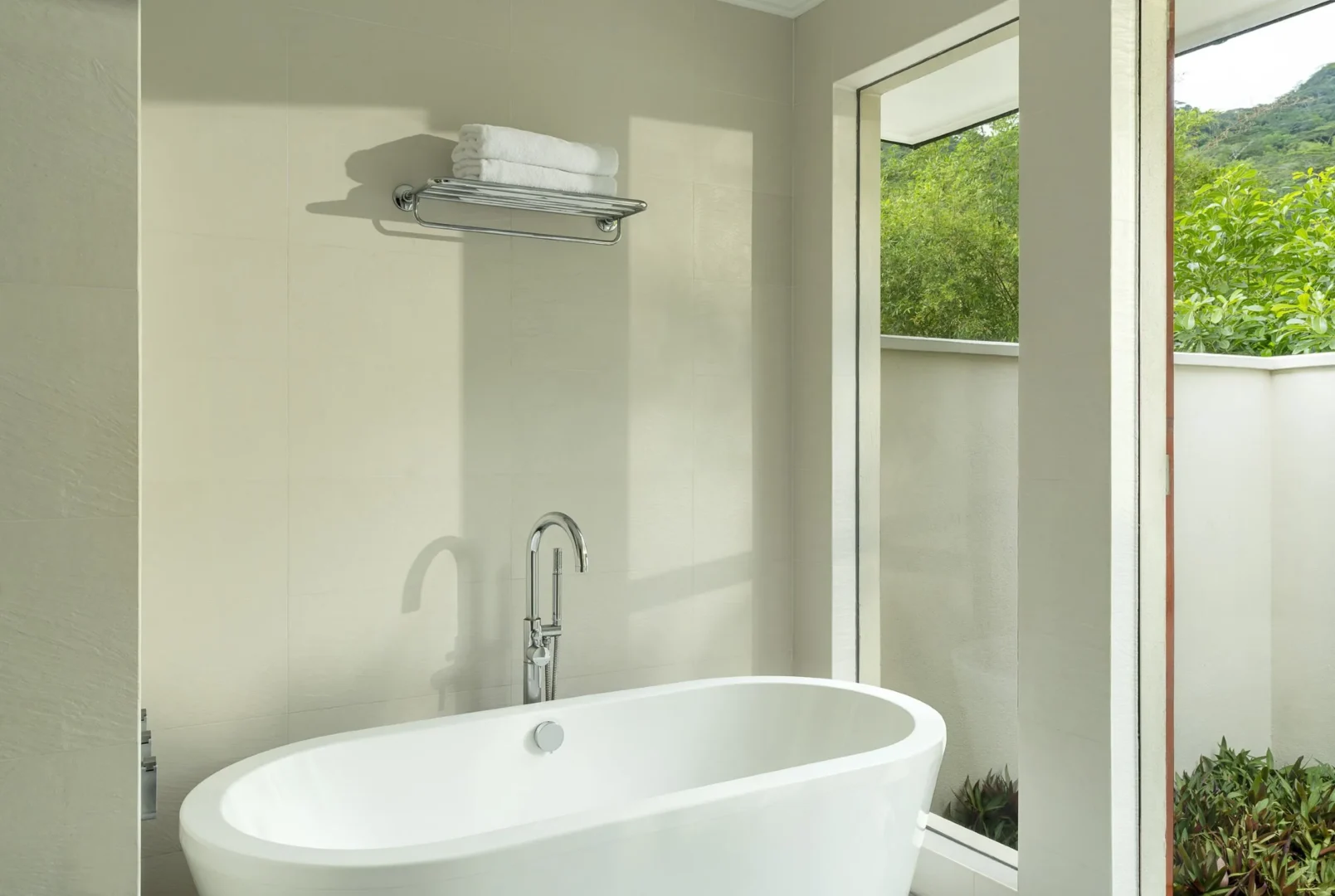 niva labriz seychelles two bedroom labriz retreat bath with freestanding tub and tropical view