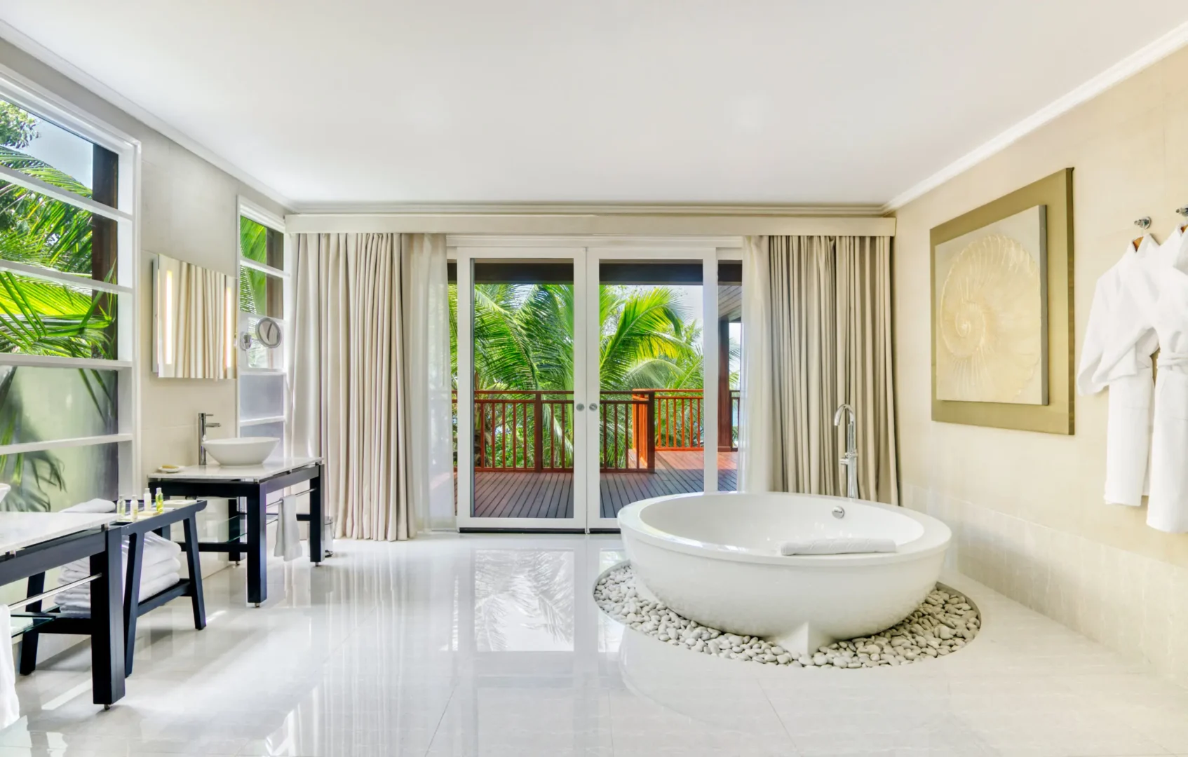 niva labriz seychelles two bedroom labriz retreat bathroom with modern fixtures and tropical surroundings