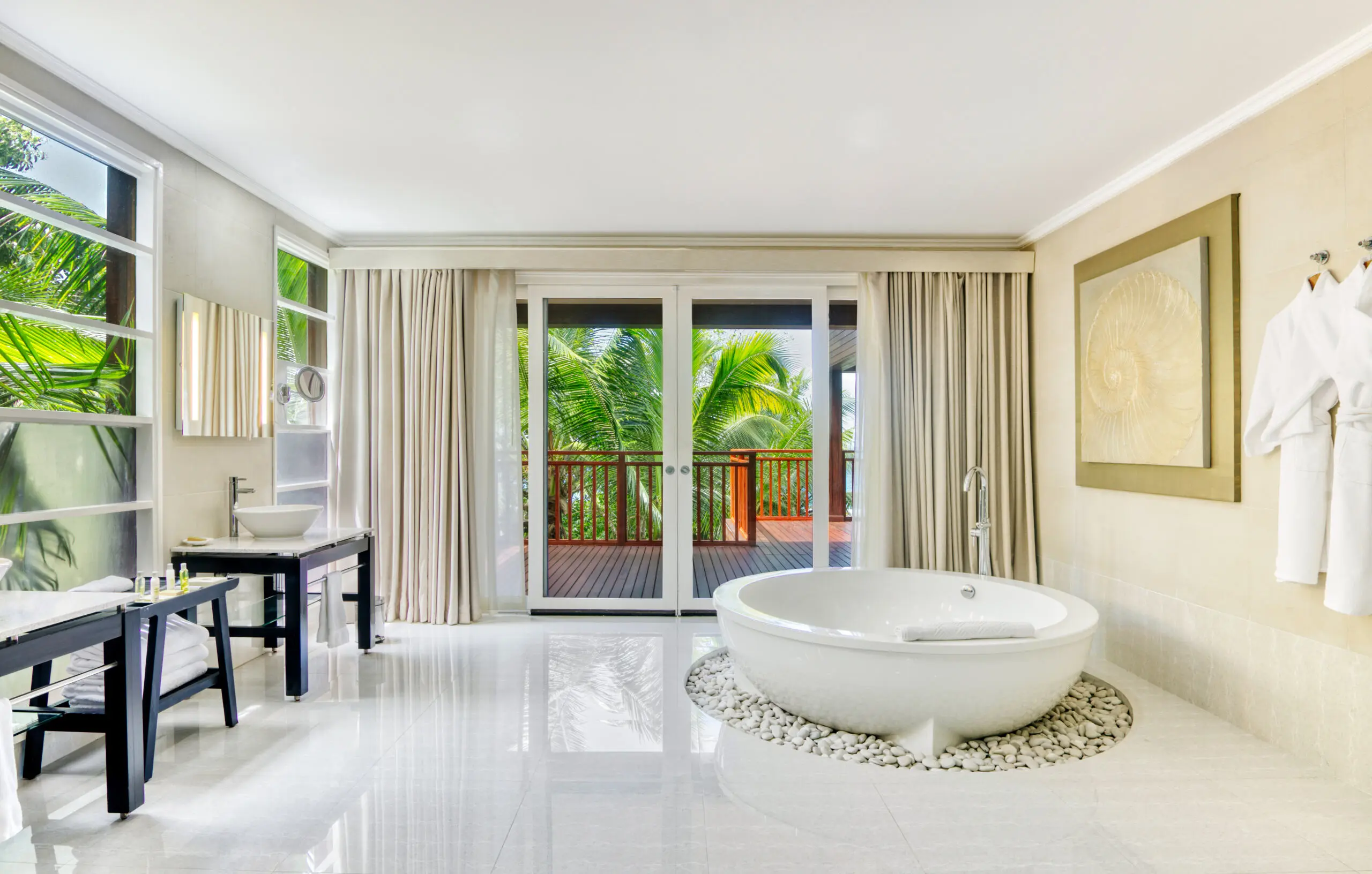 niva labriz seychelles two bedroom labriz retreat bathroom with modern fixtures and tropical surroundings