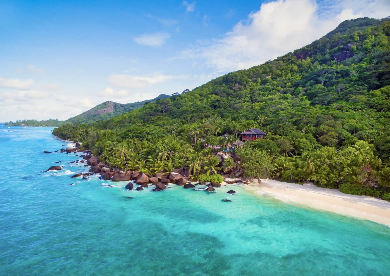 niva labriz seychelles two bedroom labriz retreat birds eye view with mountain and sea landscape