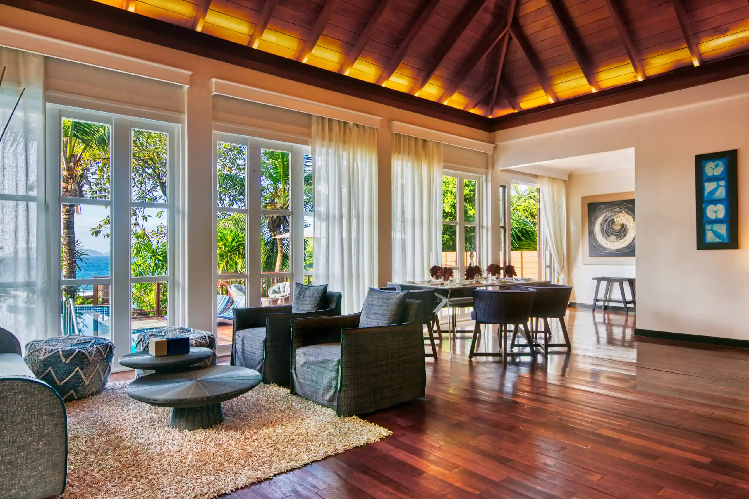 niva labriz seychelles two bedroom labriz retreat lounge area with comfortable seating and tropical view