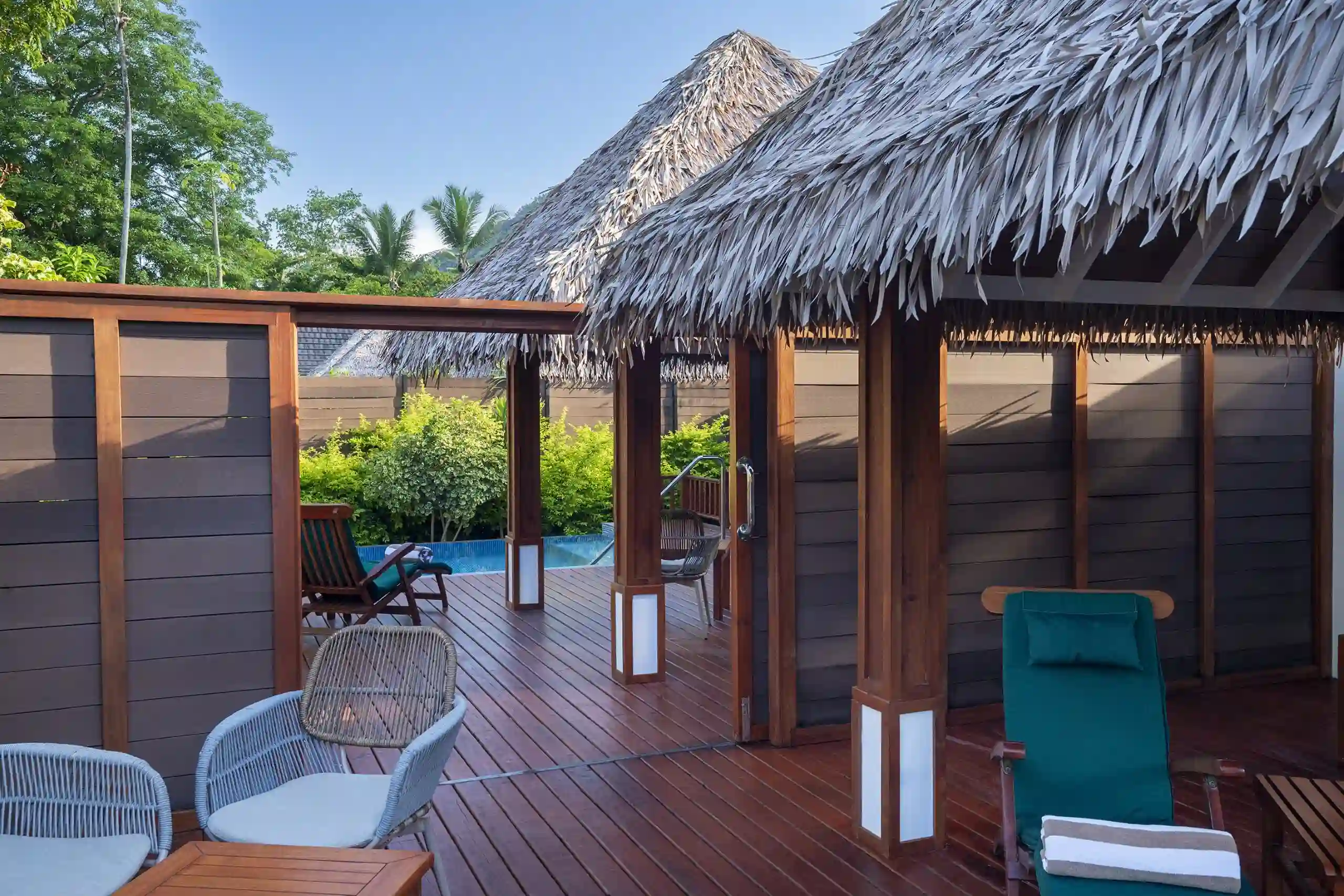 niva labriz seychelles two bedroom labriz retreat terrace with seating area and tropical view