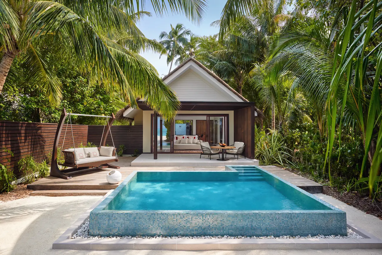 niyama private islands maldives deluxe beach pool villa front bliss scene capturing serene beachfront elegance and refined island tranquility
