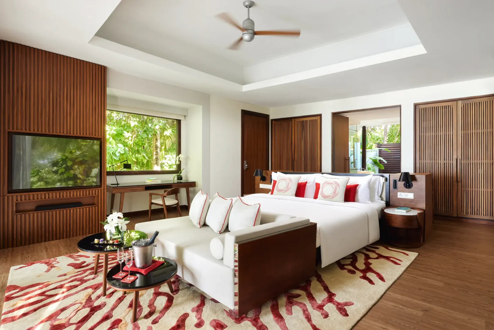 niyama private islands maldives deluxe beach villa interior bedroom featuring a calm luxury space with soft island lighting natural textures and an inviting coastal atmosphere