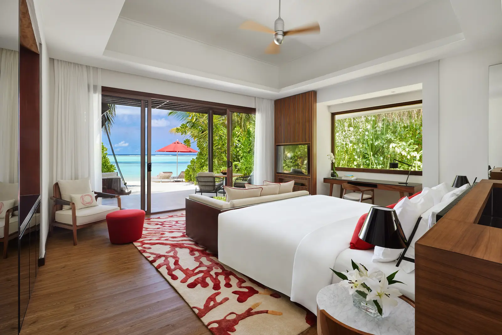 niyama private islands maldives deluxe beach villa interior escape showcasing a tranquil luxury space with warm natural textures soft island lighting and an inviting coastal atmosphere