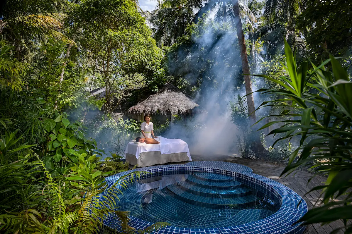 niyama private islands maldives drift spa garden massage offering serene outdoor wellness therapy surrounded by tranquil tropical greenery