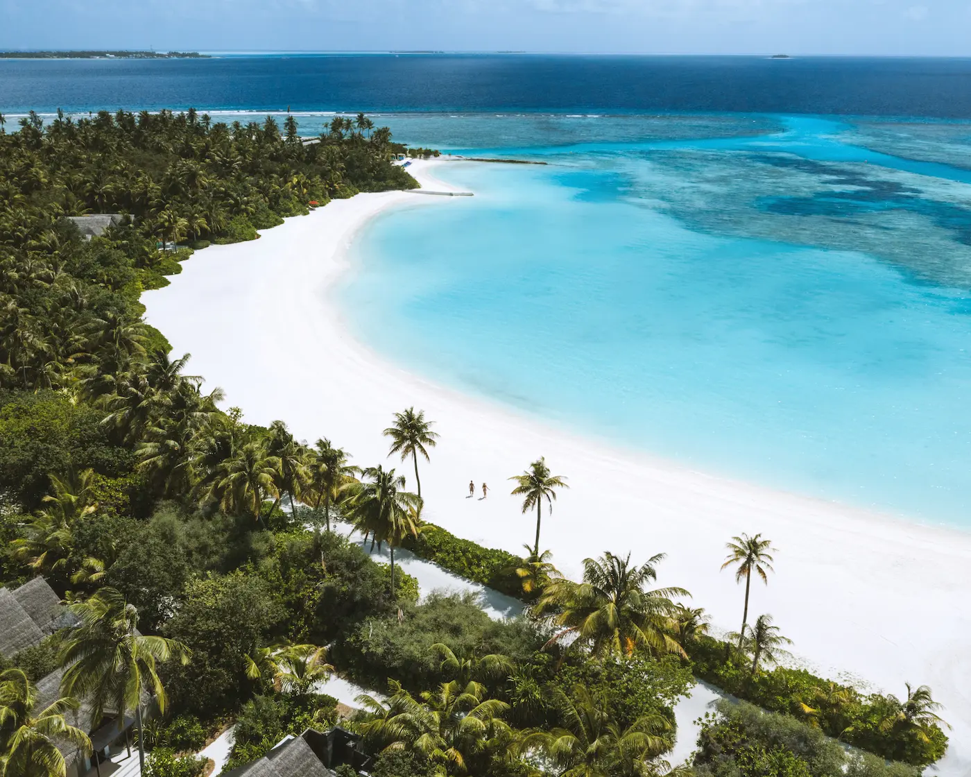 niyama private islands maldives long beach showcasing expansive white sand shoreline and serene turquoise island scenery