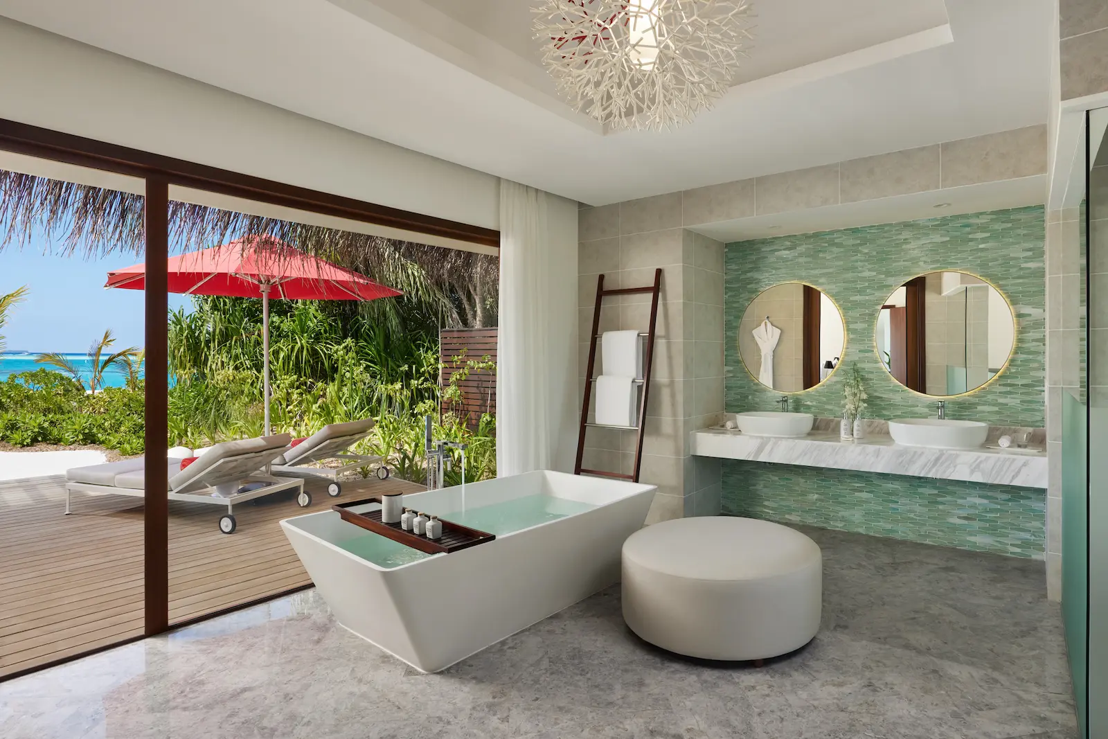 niyama private islands maldives one bedroom beach pool pavilion bathroom featuring elegant island inspired finishes and serene contemporary luxury