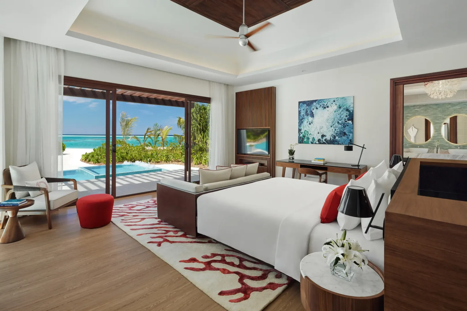niyama private islands maldives one bedroom beach pool pavilion bedroom interior featuring refined island inspired design and serene contemporary elegance