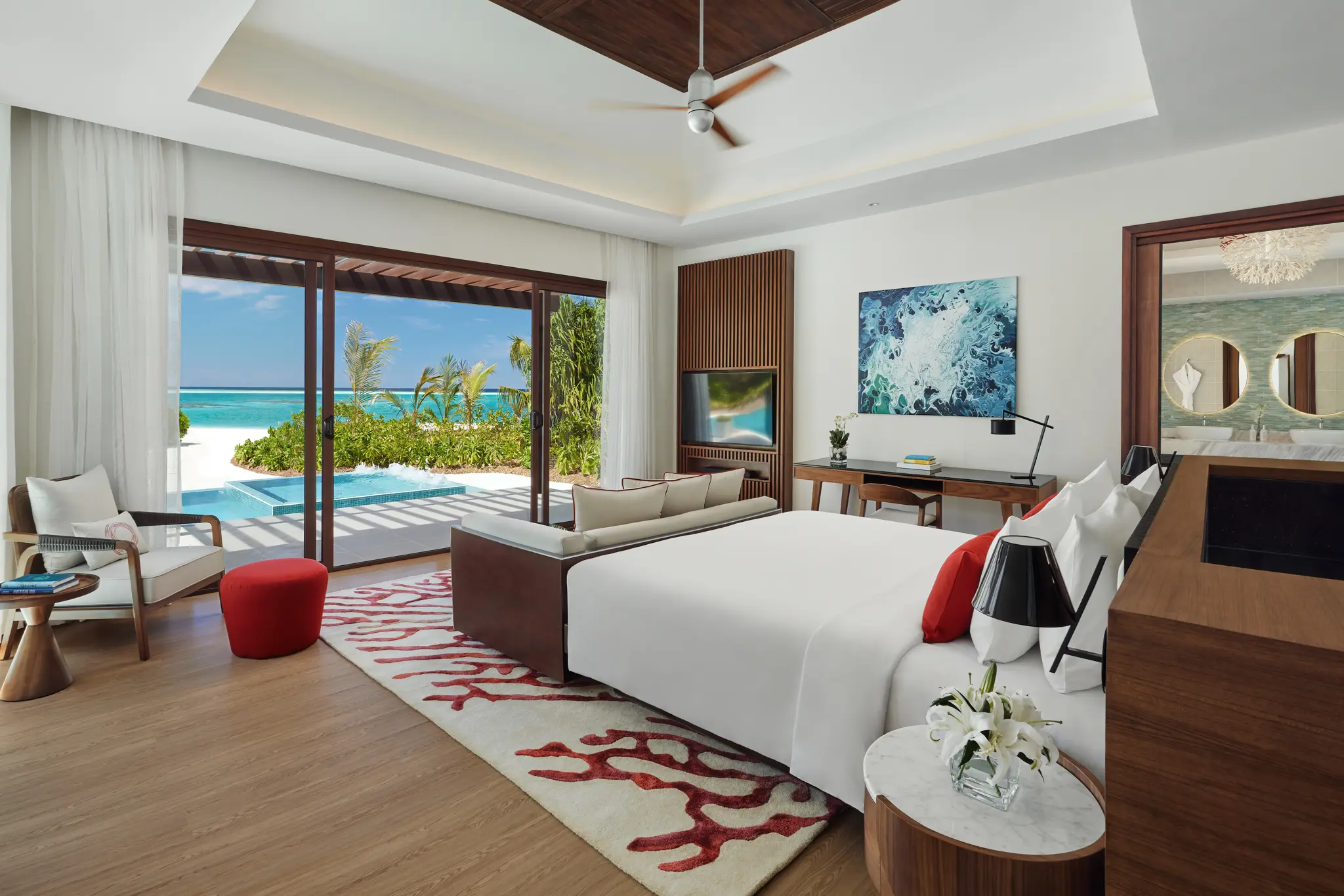 niyama private islands maldives one bedroom beach pool pavilion bedroom interior featuring refined island inspired design and serene contemporary elegance