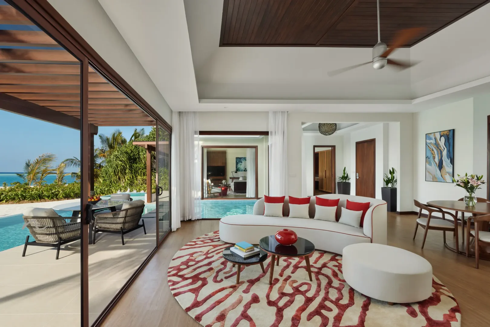 niyama private islands maldives one bedroom beach pool pavilion living room featuring spacious island inspired design and refined contemporary comfort