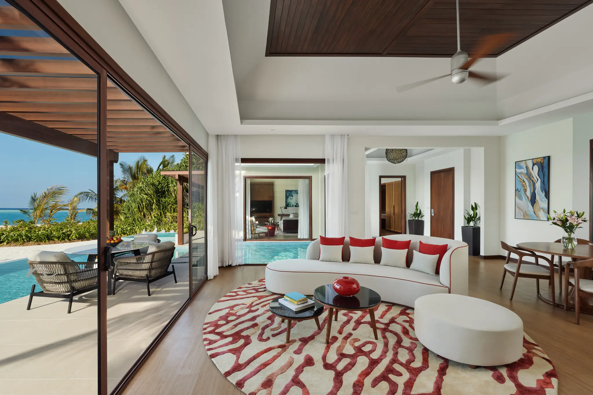 niyama private islands maldives one bedroom beach pool pavilion living room featuring spacious island inspired design and refined contemporary comfort