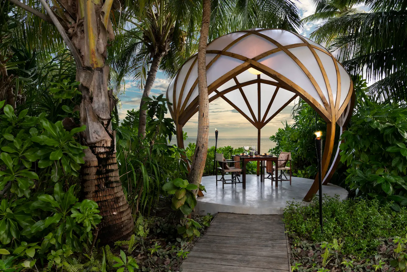 niyama private islands maldives tribal restaurant baobab pod showcasing elevated jungle inspired dining and refined island ambiance