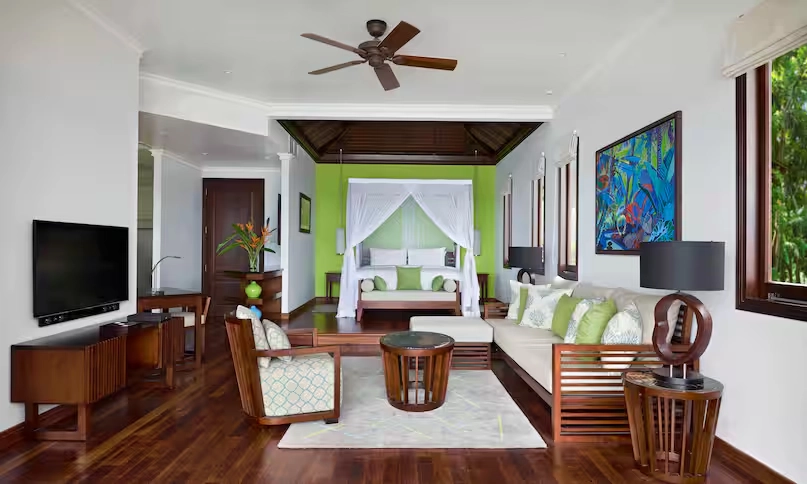 lounge area at northolme grand oceanview villa with infinity pool, modern furniture, and panoramic ocean views