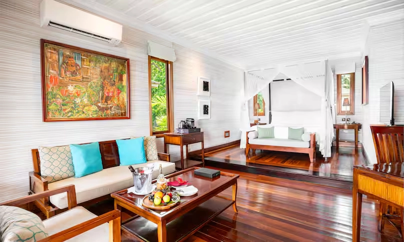 spacious room in northolme king ocean view villa with king bed, modern furnishings, and panoramic ocean view