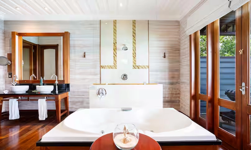 whirlpool bathtub in northolme king ocean view villa overlooking turquoise ocean