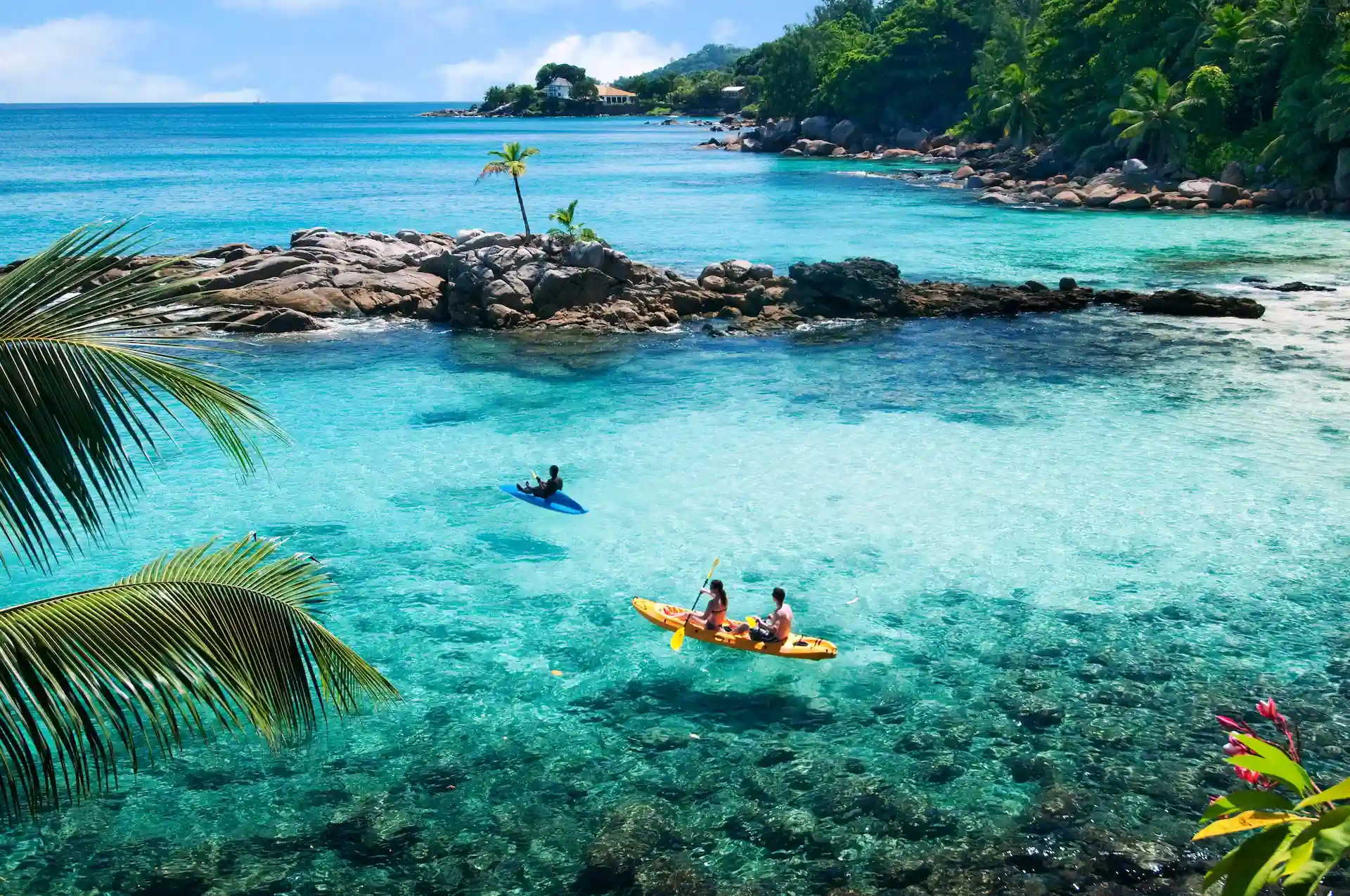 aerial view of turquoise waters with kayaks at northolme seychelles beach