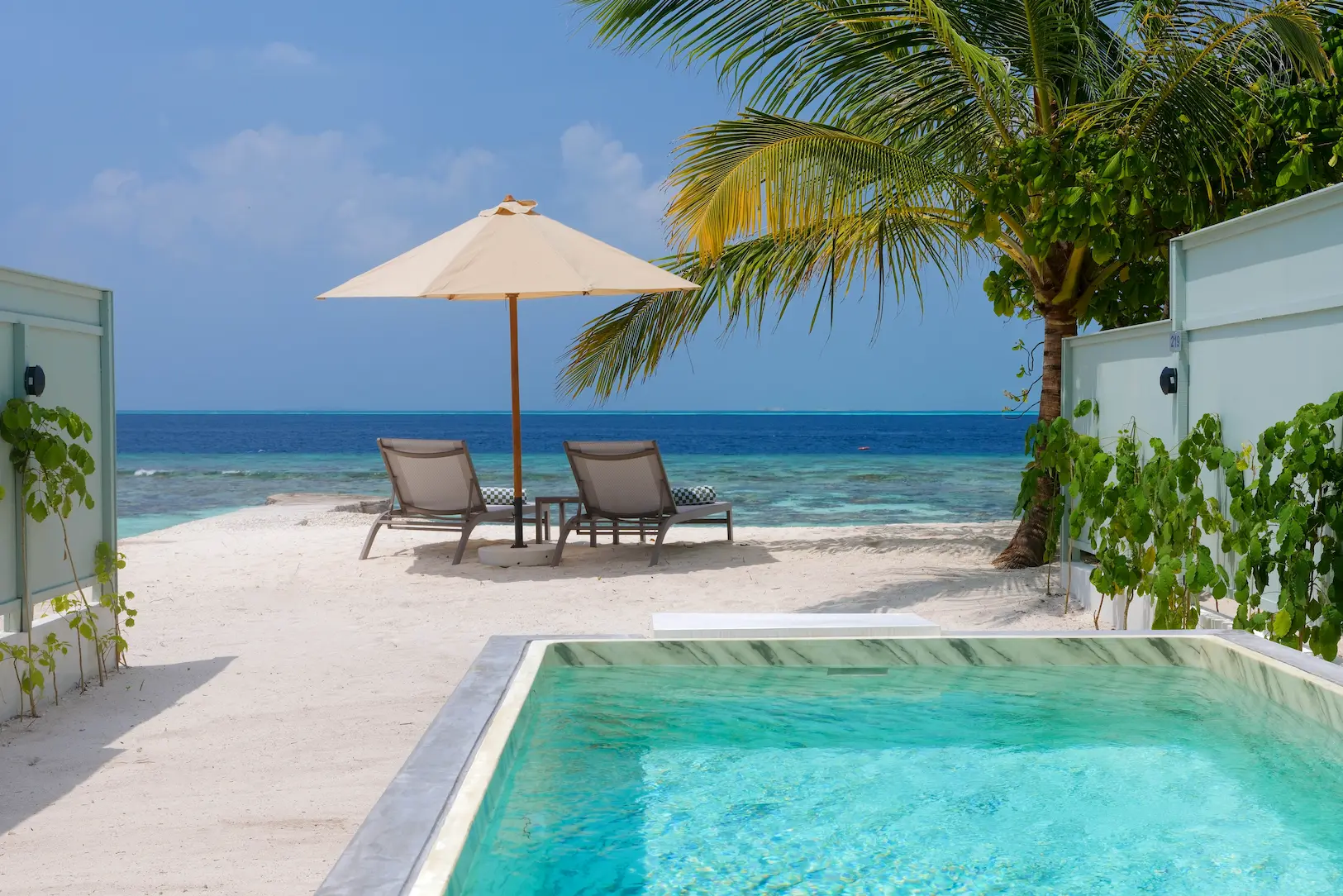 oblu nature helengeli deluxe beach villa with pool exterior featuring a calm beachfront setting lush tropical greenery and a serene island ambiance