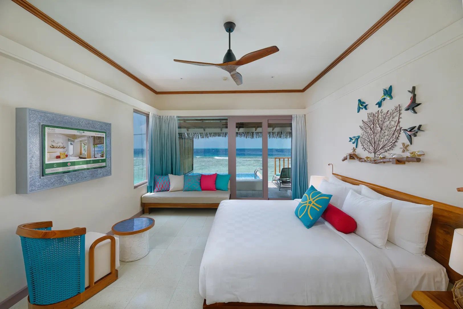 oblu nature helengeli lagoon villas interior bedroom with soft natural tones elegant island decor and a calm overwater ambience