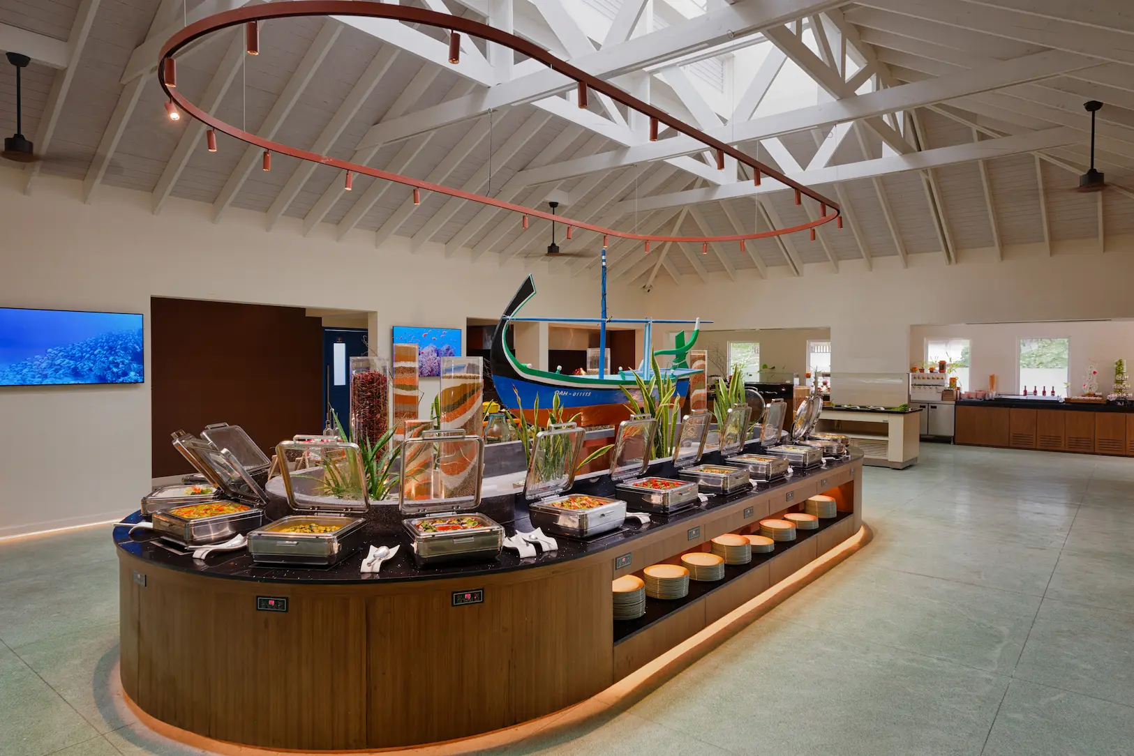 oblu nature helengeli spice main restaurant interior buffet featuring elegant island styling warm natural textures and a calm inviting dining atmosphere