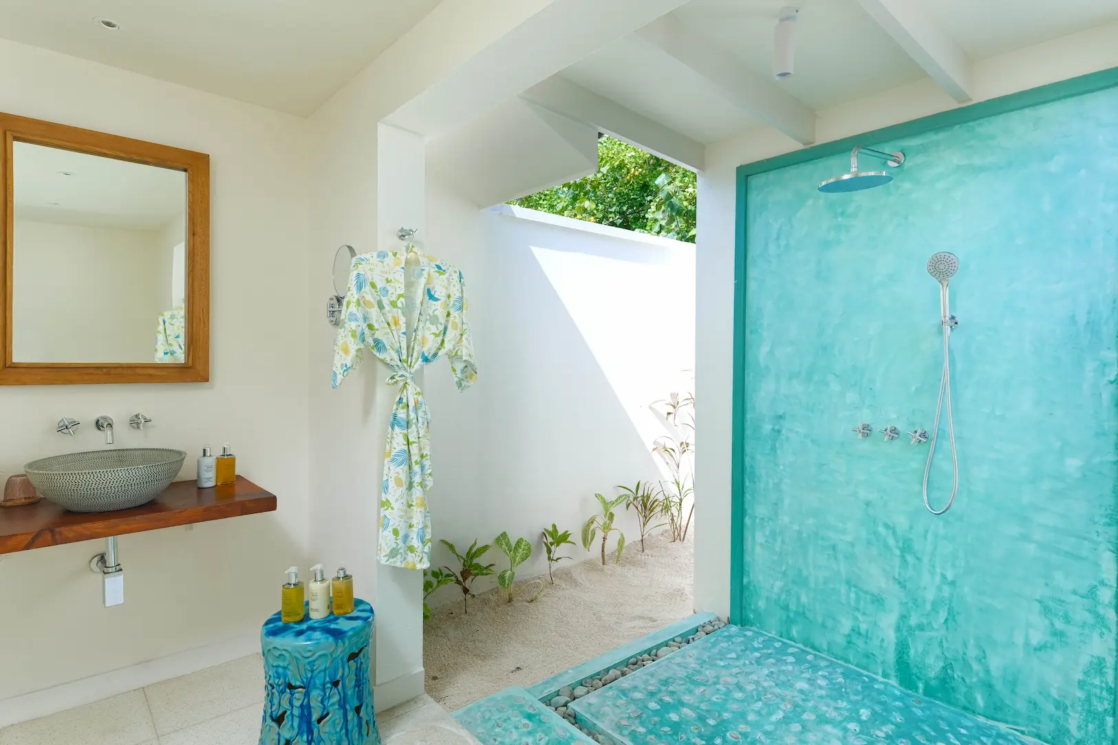 oblu nature helengeli two bedroom family villa with pool bathroom outdoor shower featuring natural island textures and a calm open air spa like atmosphere