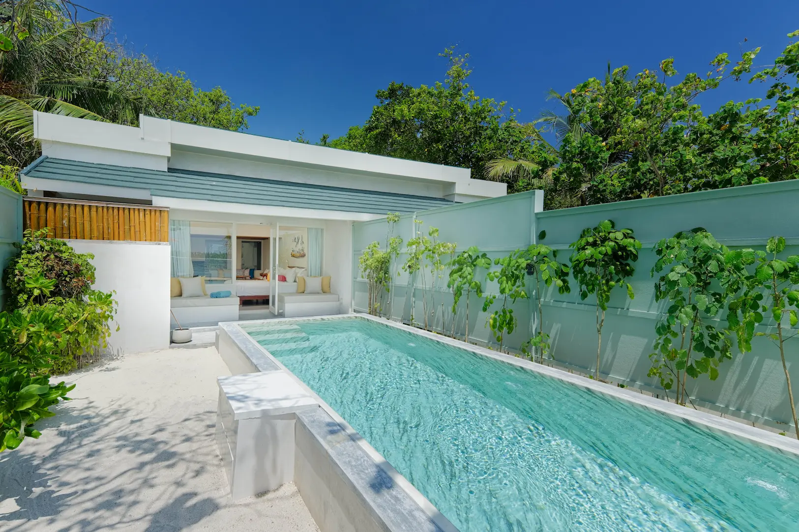 oblu nature helengeli two bedroom family villa with pool exterior featuring lush tropical greenery serene island design and a calm private setting