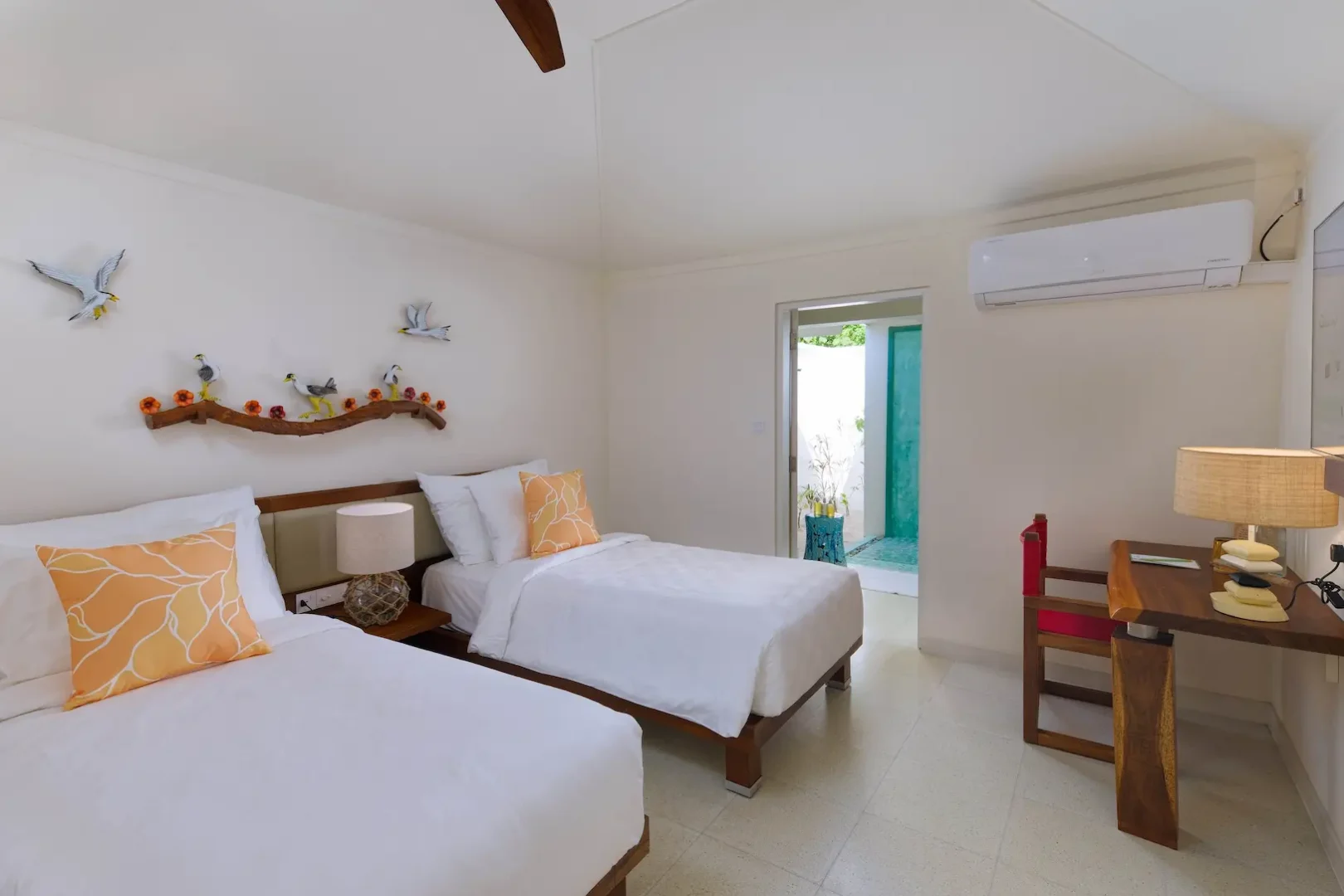 oblu nature helengeli two bedroom family villa with pool interior twin bedroom featuring soft natural tones relaxed island styling and a calm welcoming atmosphere
