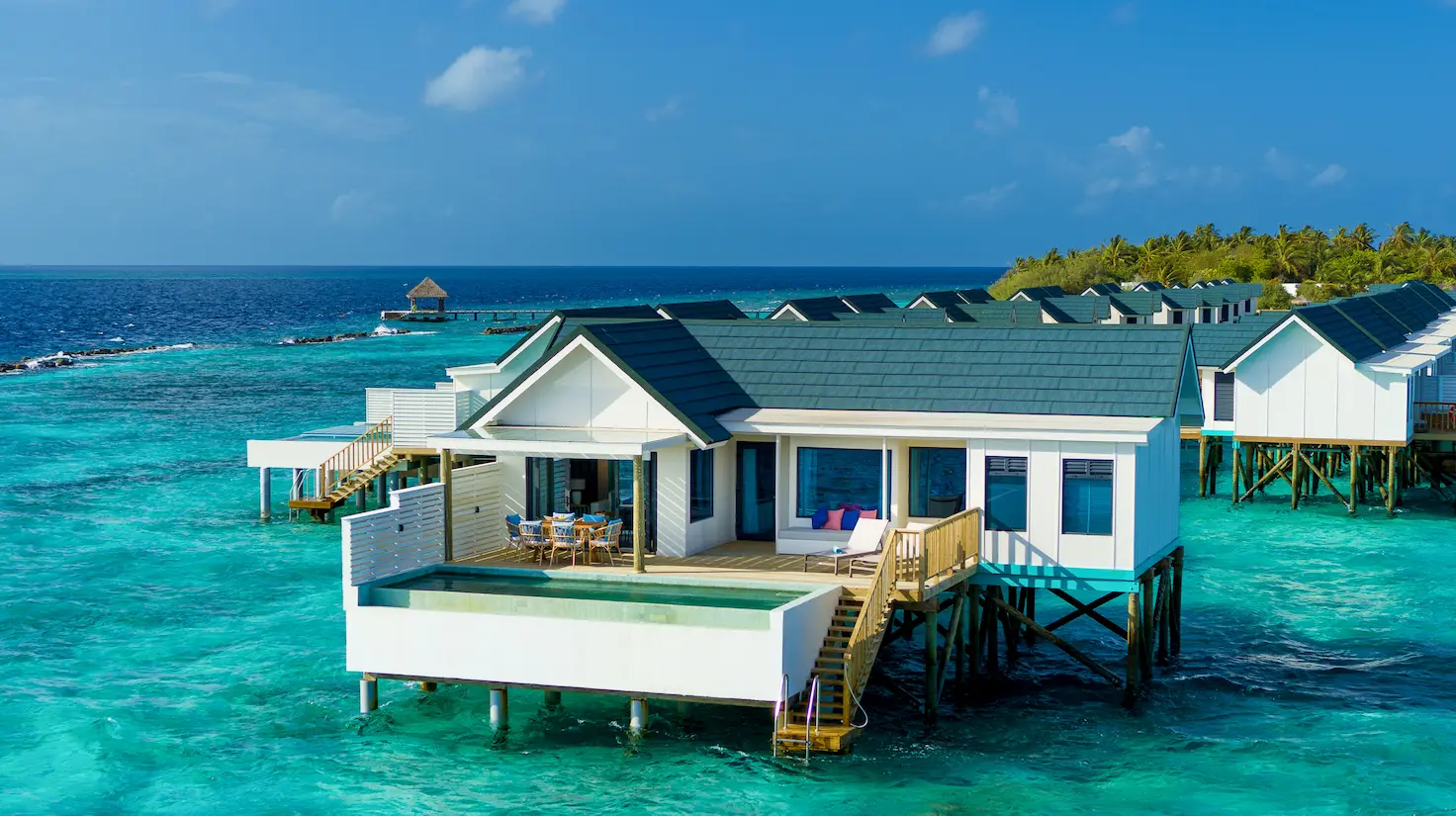oblu nature helengeli water suite with pool aerial featuring serene overwater setting expansive lagoon views and a calm luxury island atmosphere