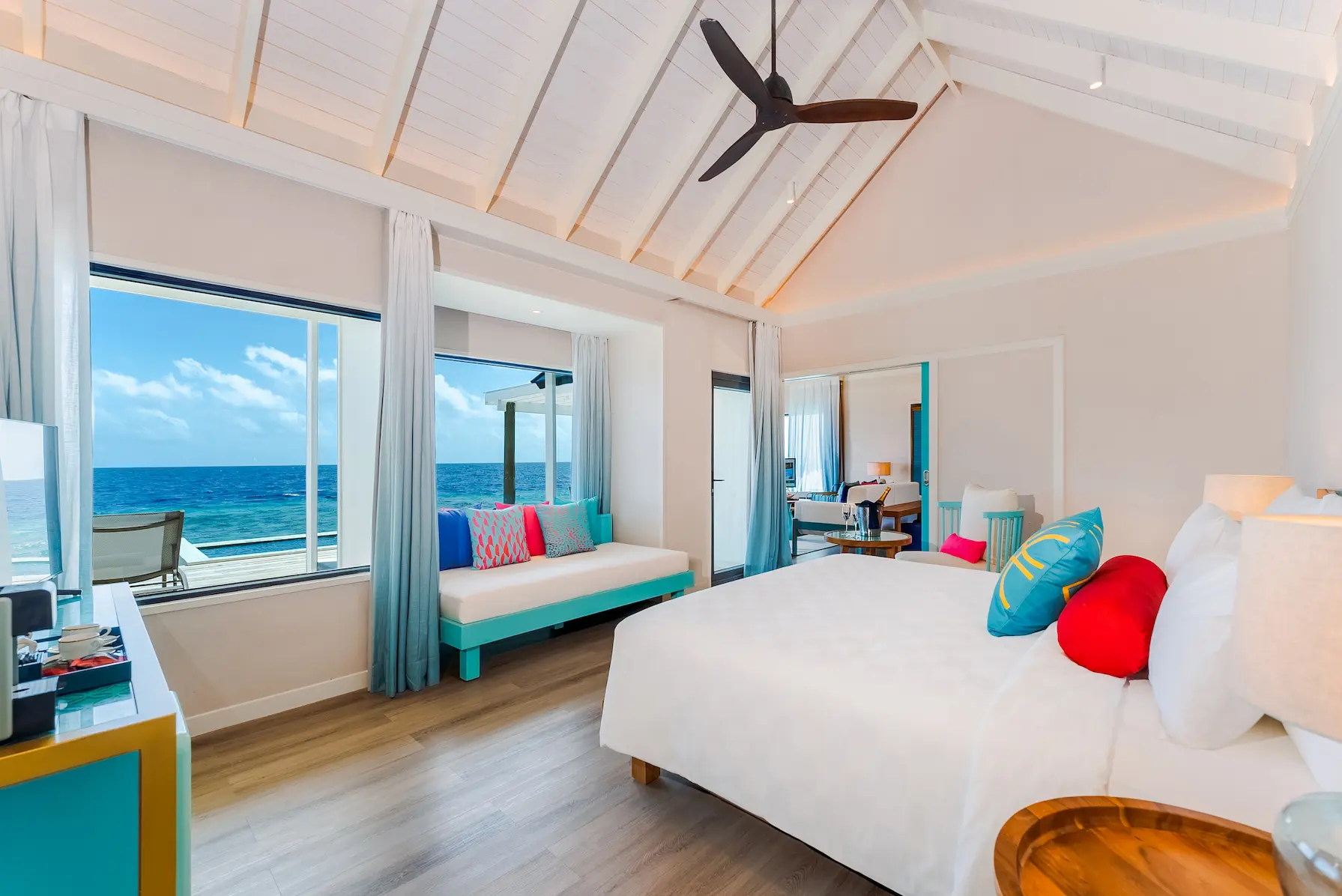 oblu nature helengeli water suite with pool bedroom featuring refined island decor soft natural tones and a calm overwater ambience