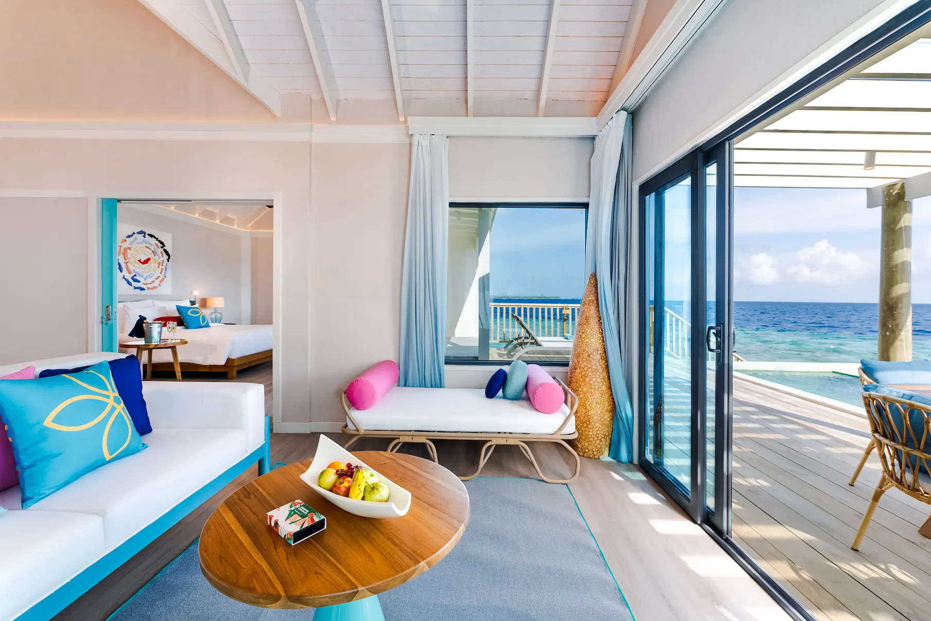 oblu nature helengeli water suite with pool living room sofa area featuring soft natural textures elegant island styling and a calm spacious overwater ambience