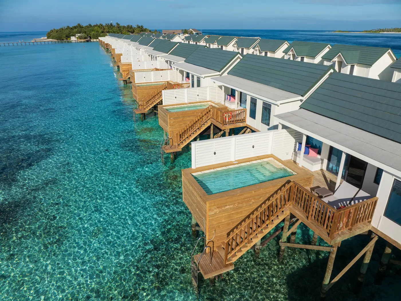 oblu nature helengeli water villa with pool aerial exterior showing serene overwater villas turquoise lagoon views and a calm island atmosphere