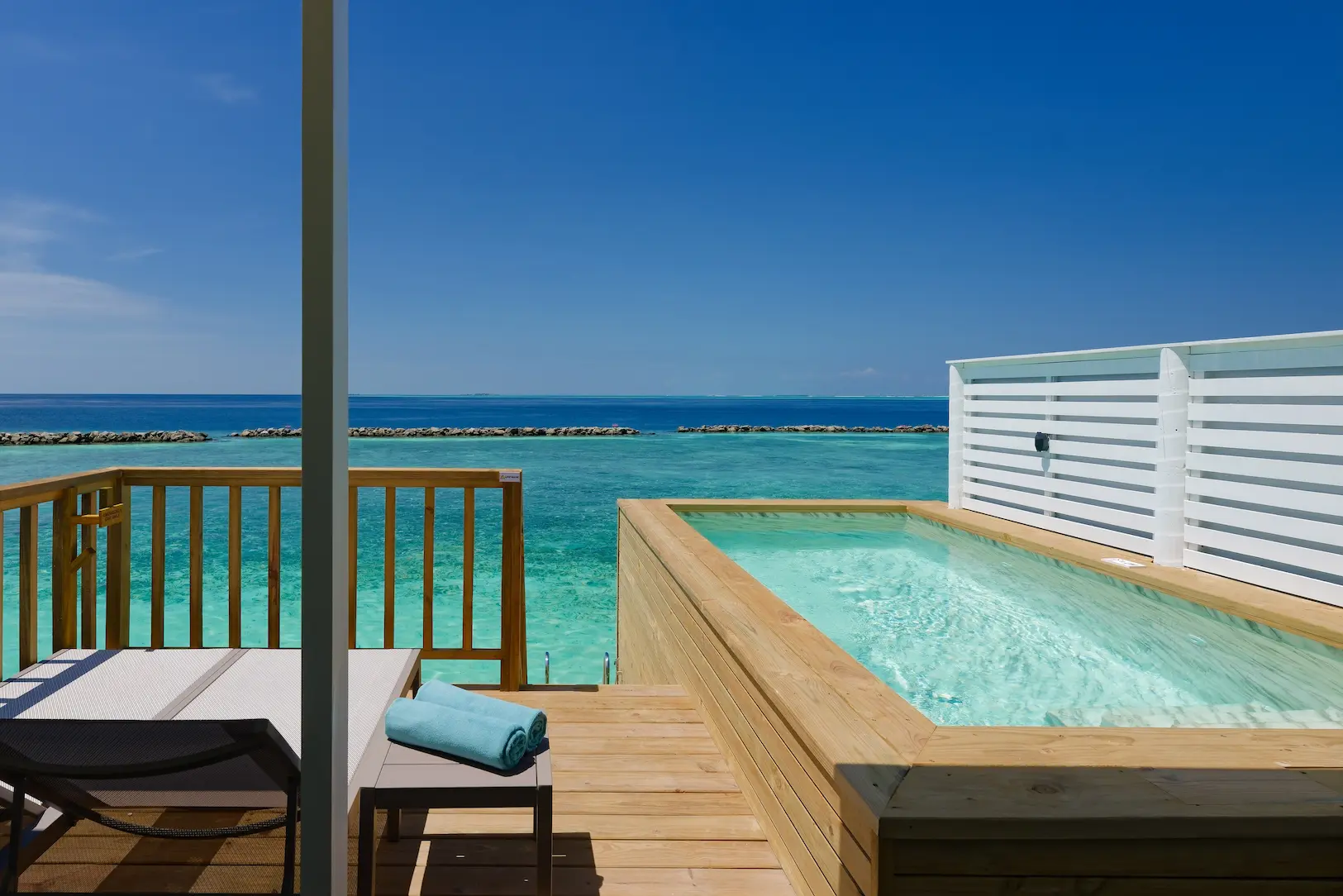 oblu nature helengeli water villa with pool exterior featuring serene overwater setting turquoise lagoon views and a calm island atmosphere