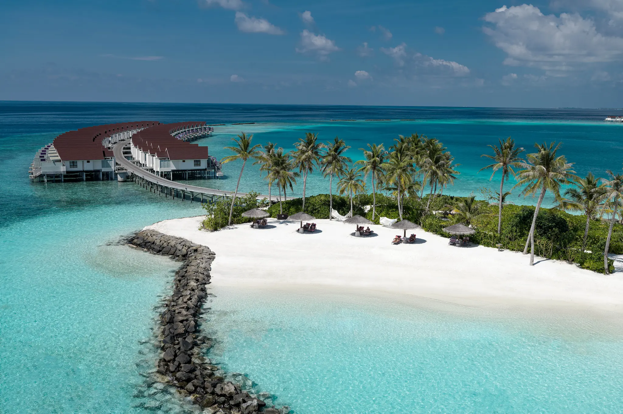 oblu select lobigili maldives full island aerial beach sweeping island aerial showcasing pristine beach turquoise lagoon and serene tropical luxury