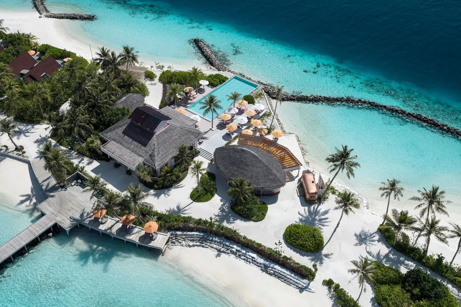 oblu select lobigili maldives island aerial swing bar elevated aerial view of tropical island swing bar surrounded by turquoise waters and serene luxury ambience