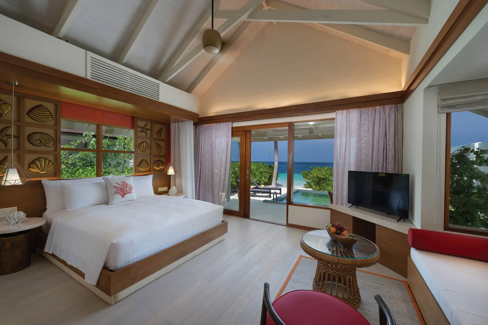 oblu select lobigili maldives sunnest beach pool villa bedroom with view two bright oceanfacing bedroom with soft natural light and refined island elegance