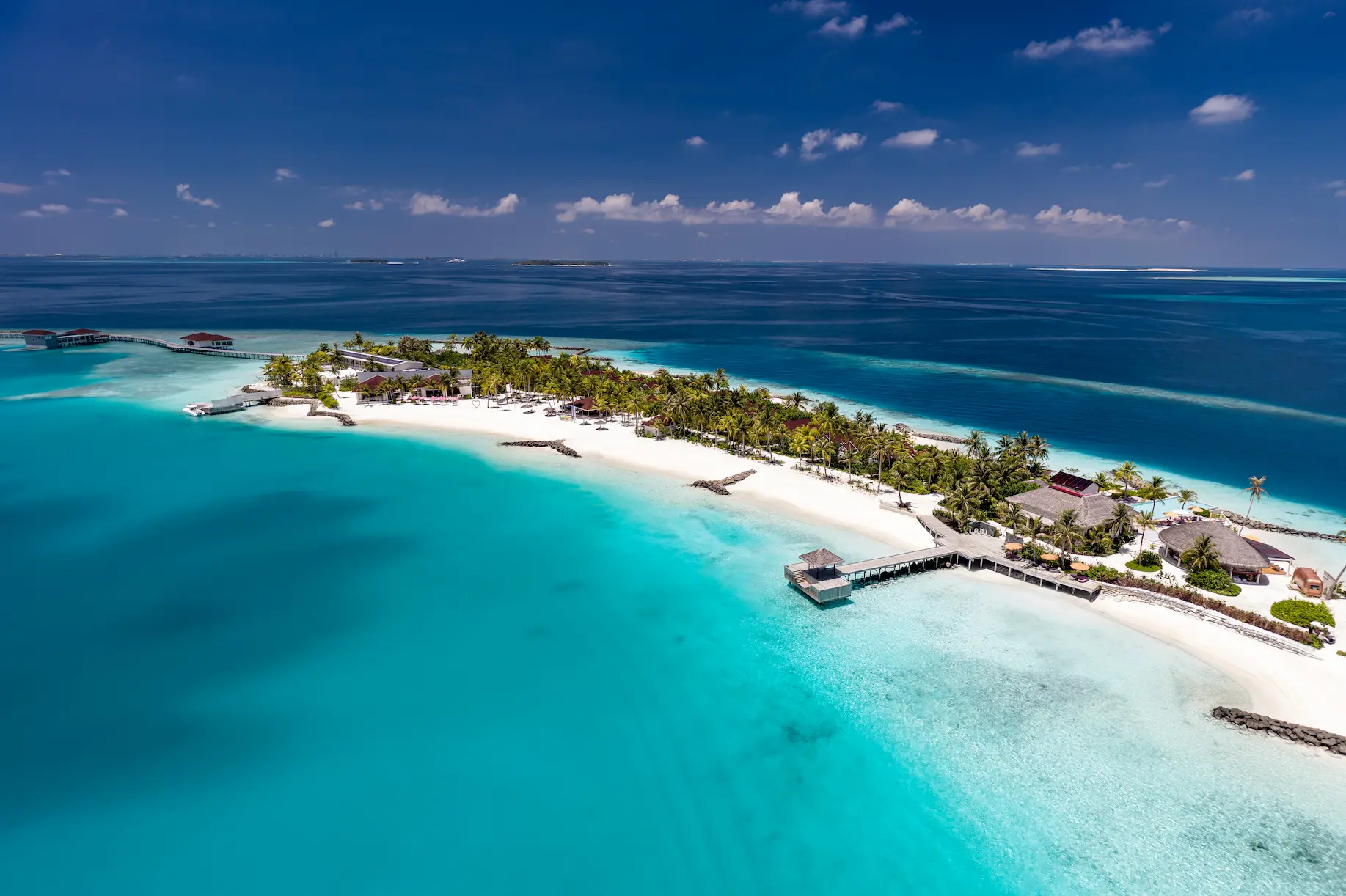 oblu select lobigili maldives water villa elegant overwater villa with panoramic lagoon views warm wood textures and serene tropical ambience