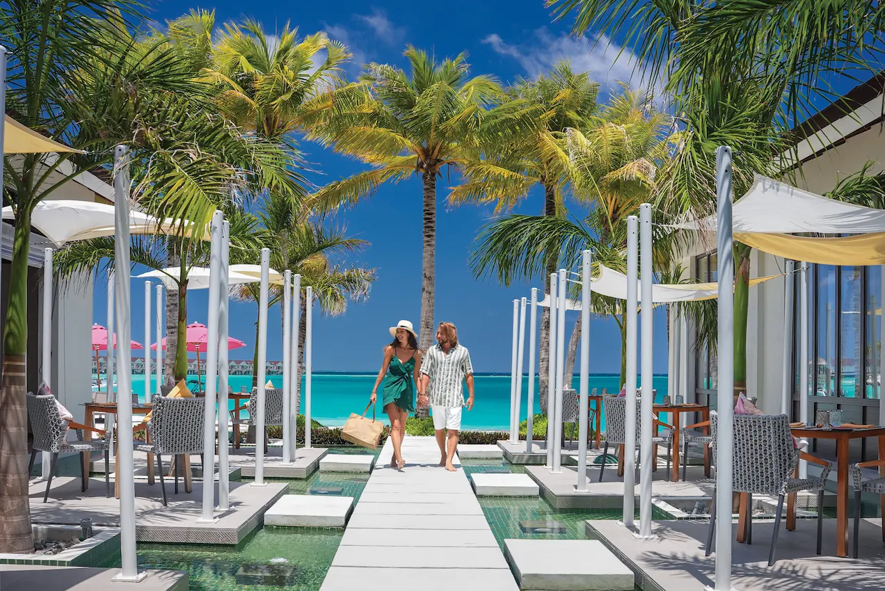 oblu select lobigili maldives ylang ylang lifestyle refined dining space with warm ambient lighting tropical tones and elegant contemporary island style