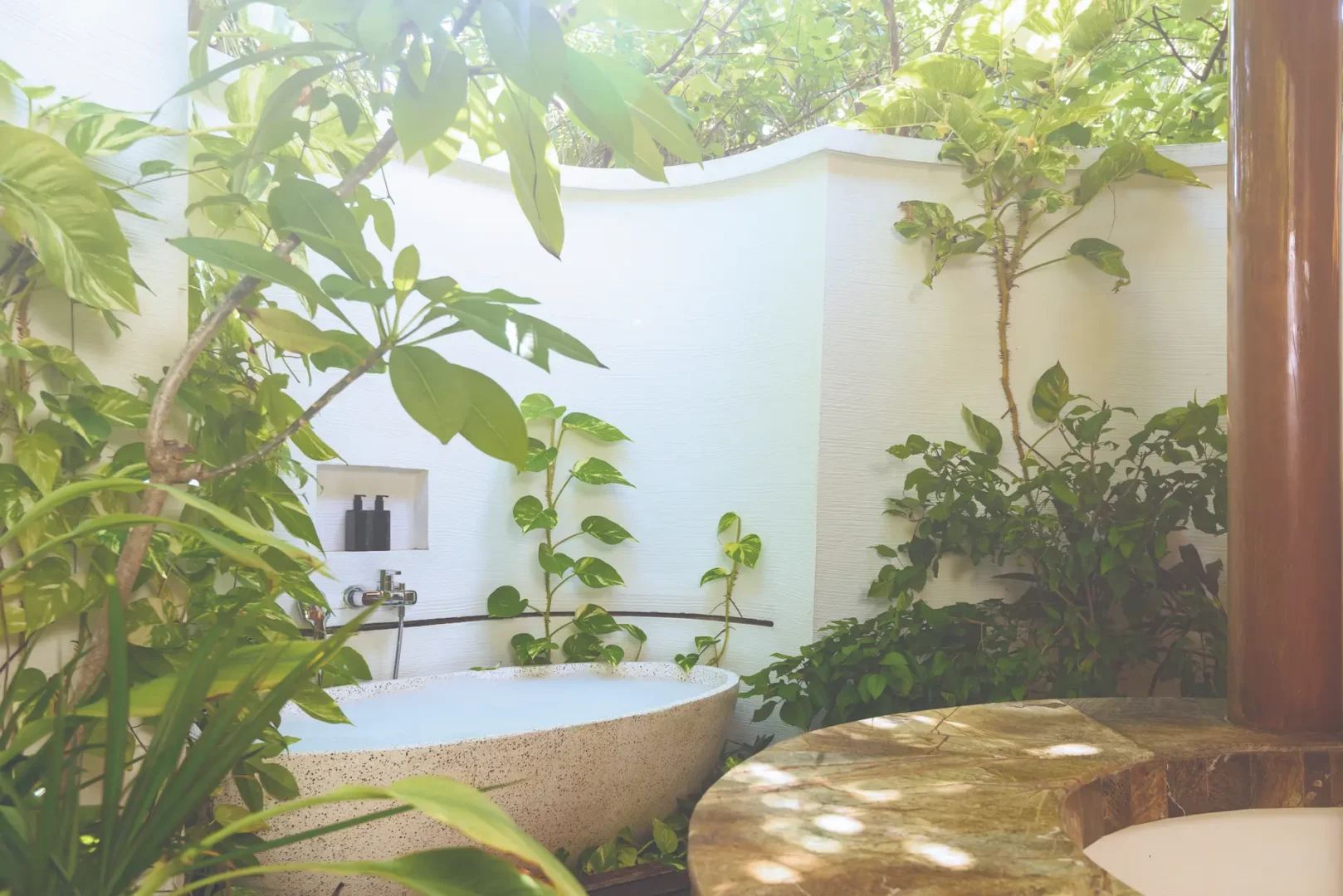 oblu select sangeli maldives beach villa bathroom interior elegant bathroom with natural textures openair elements and serene tropical island ambience