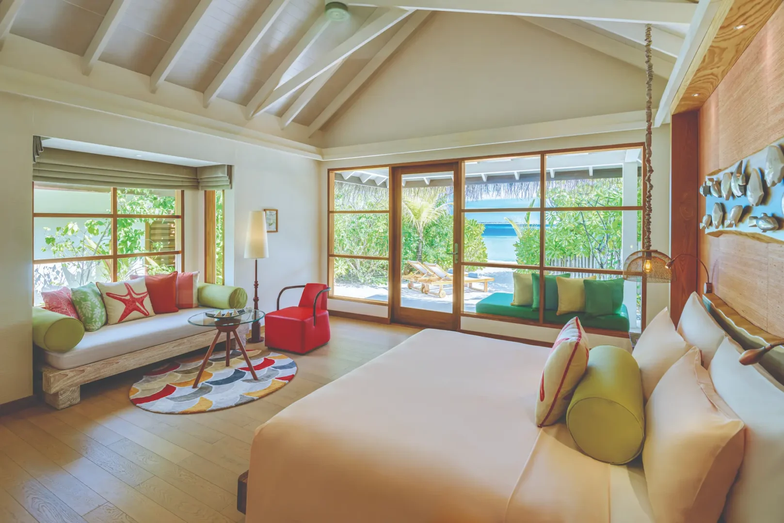oblu select sangeli maldives beach villa bedroom interior serene tropical bedroom with soft natural light warm wood textures and elegant island design