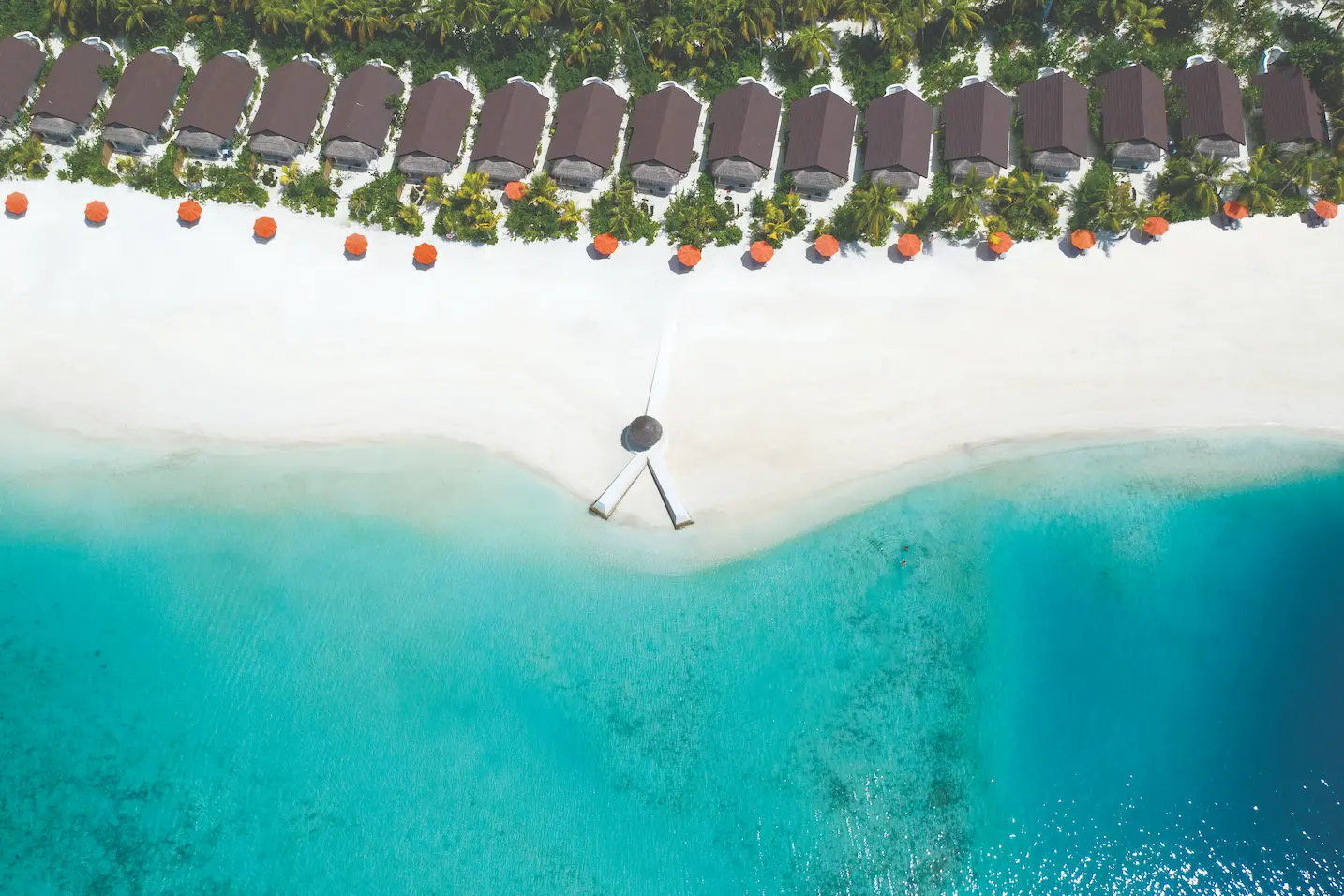 oblu select sangeli maldives beach villa segment serene tropical villa setting with lush greenery warm textures and elegant island ambience