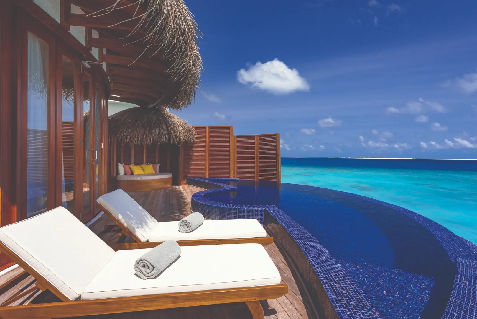 oblu select sangeli maldives honeymoon ocean suite deck and pool romantic overwater deck with private pool panoramic lagoon views and serene tropical ambience