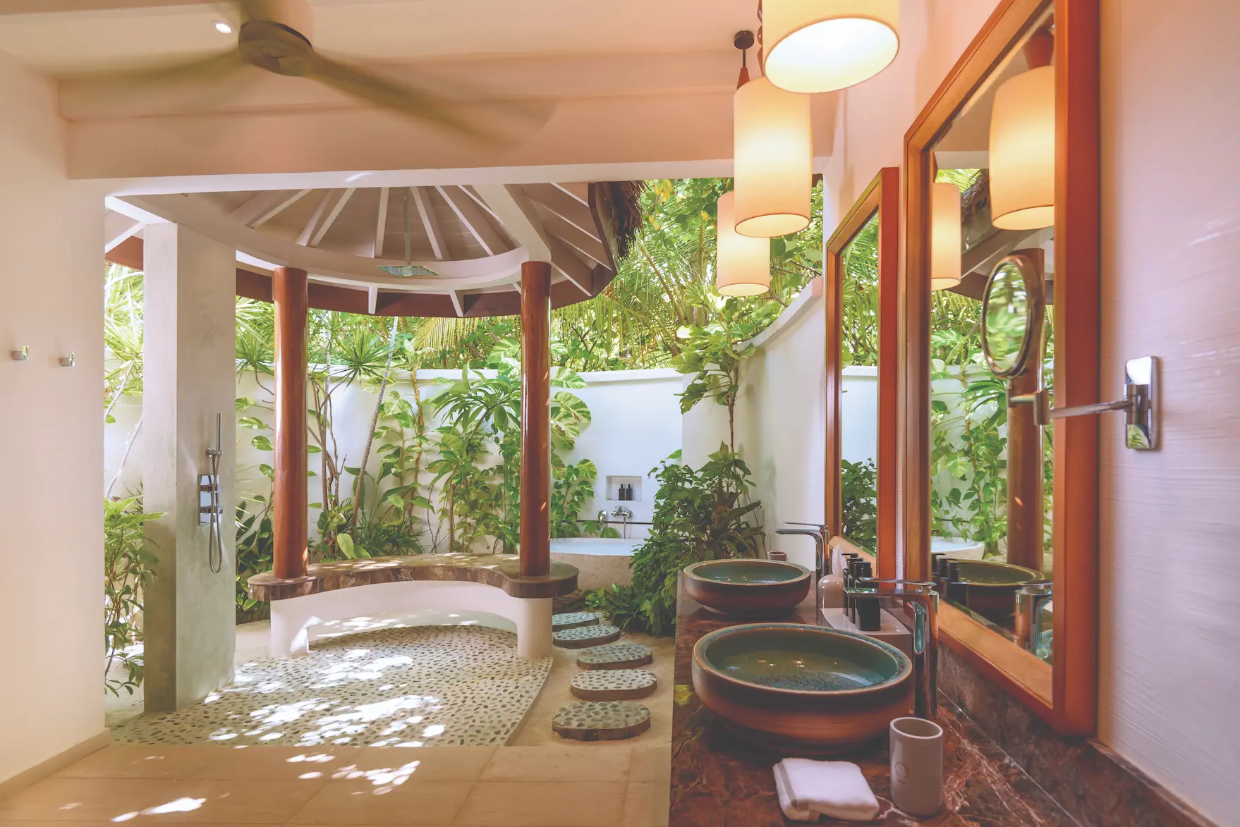 oblu select sangeli maldives two bedroom family suite master bathroom interior spacious master bathroom with elegant finishes warm natural textures and serene island ambience