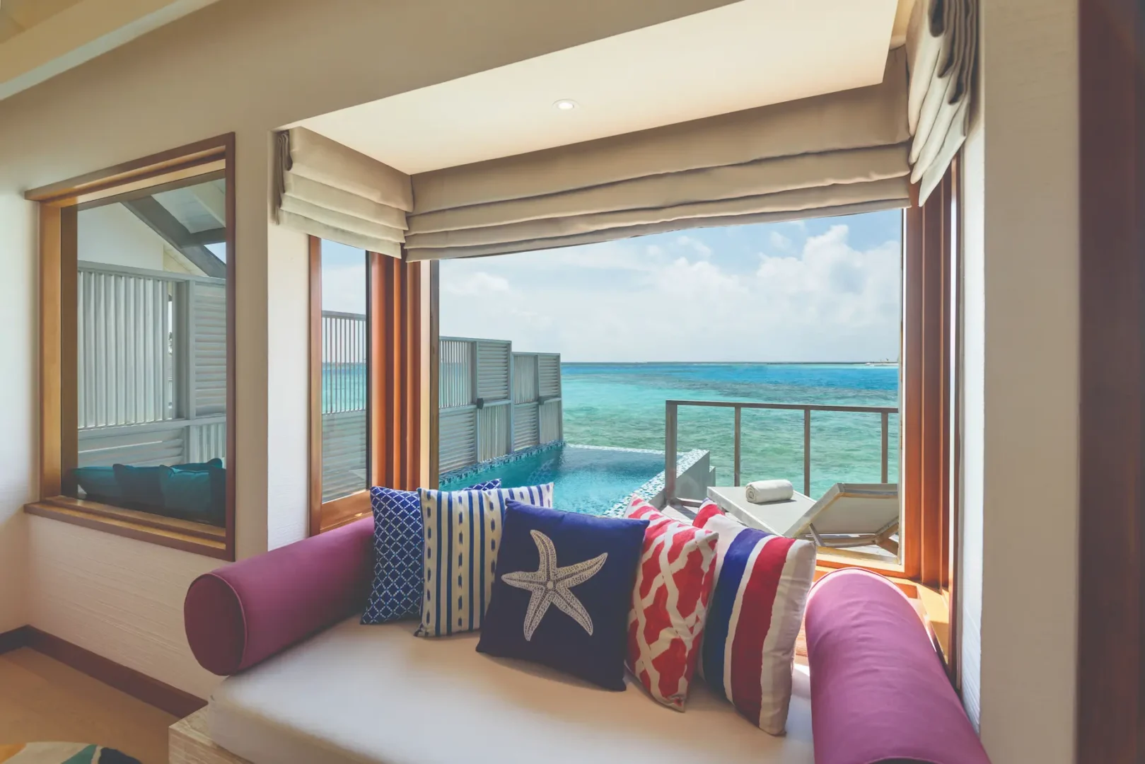 oblu select sangeli maldives water villa with pool view tranquil overwater pool villa scene with panoramic lagoon views warm natural textures and serene tropical ambience