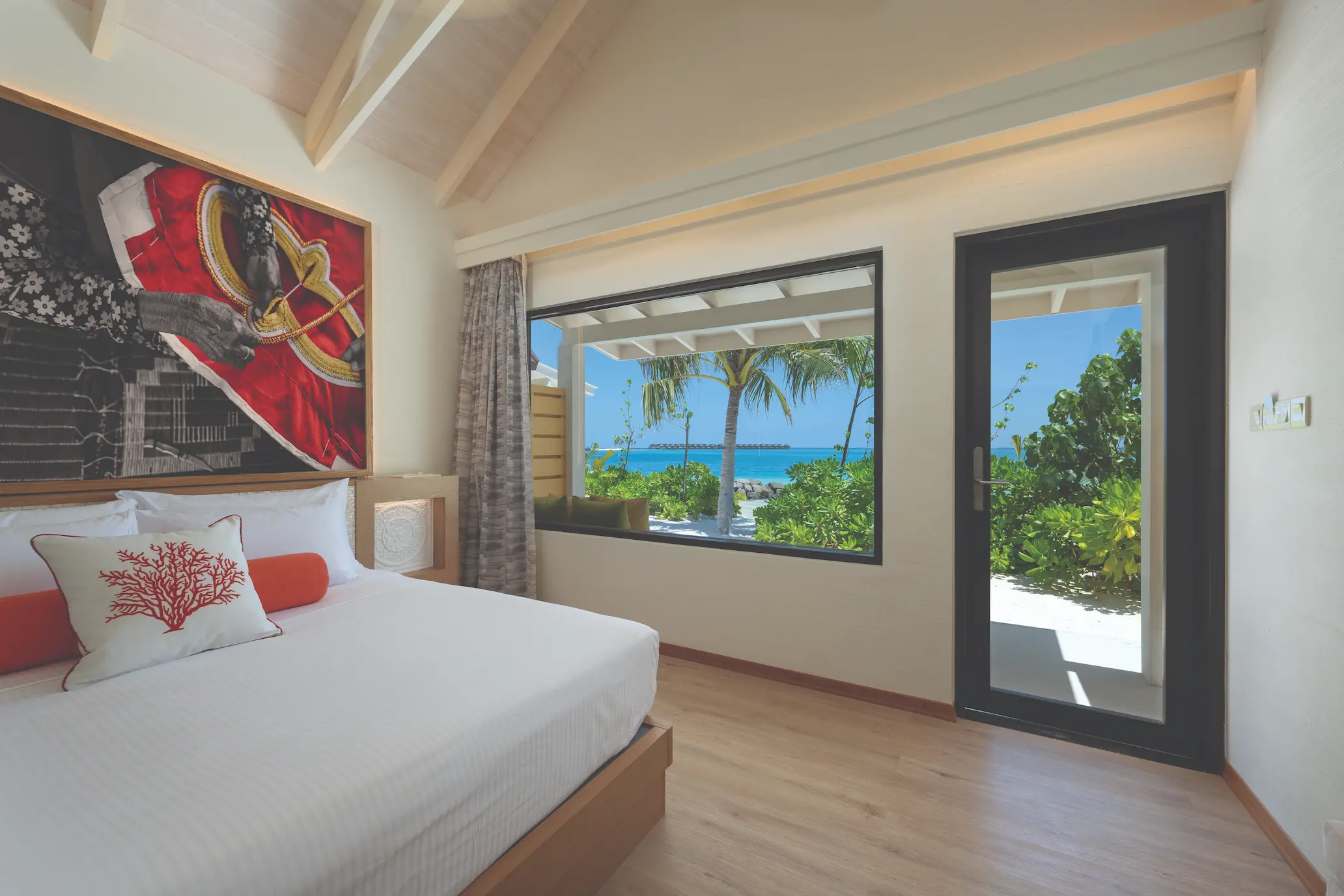 oblu xperience ailafushi beach villa bedroom with view ailafushi maldives