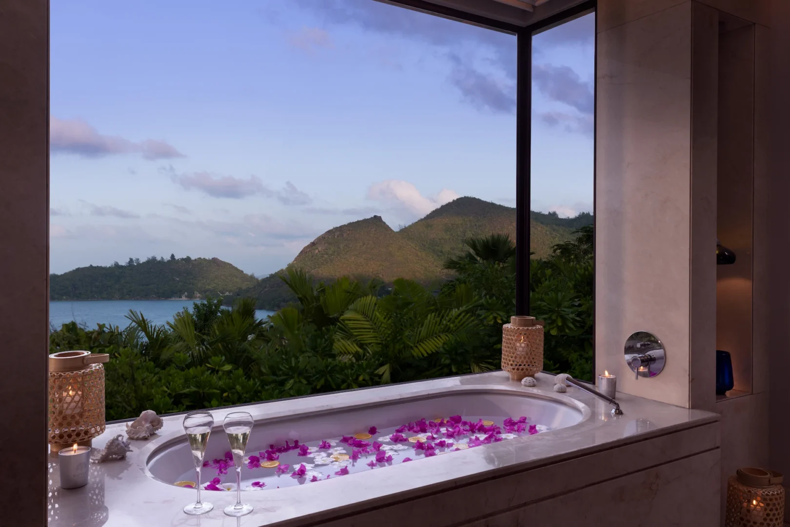 romantic bath in ocean view pool villa in seychelles