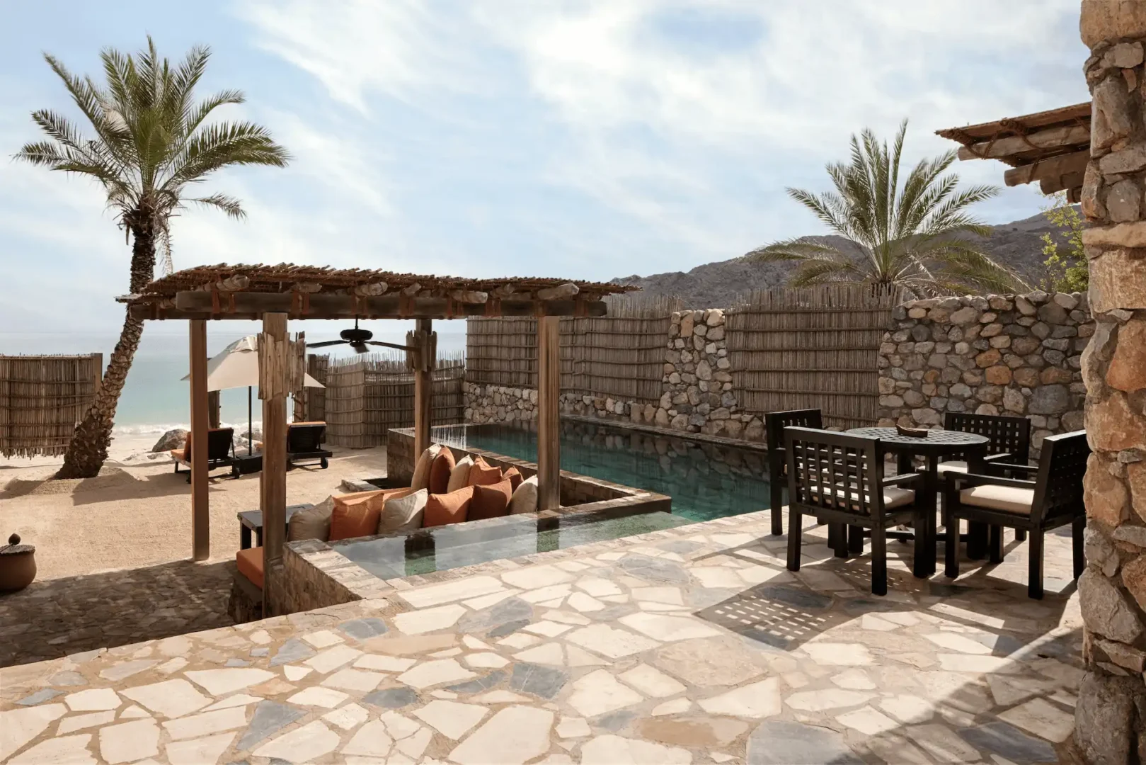 outside view of pool villa beachfront at six senses zighy bay oman