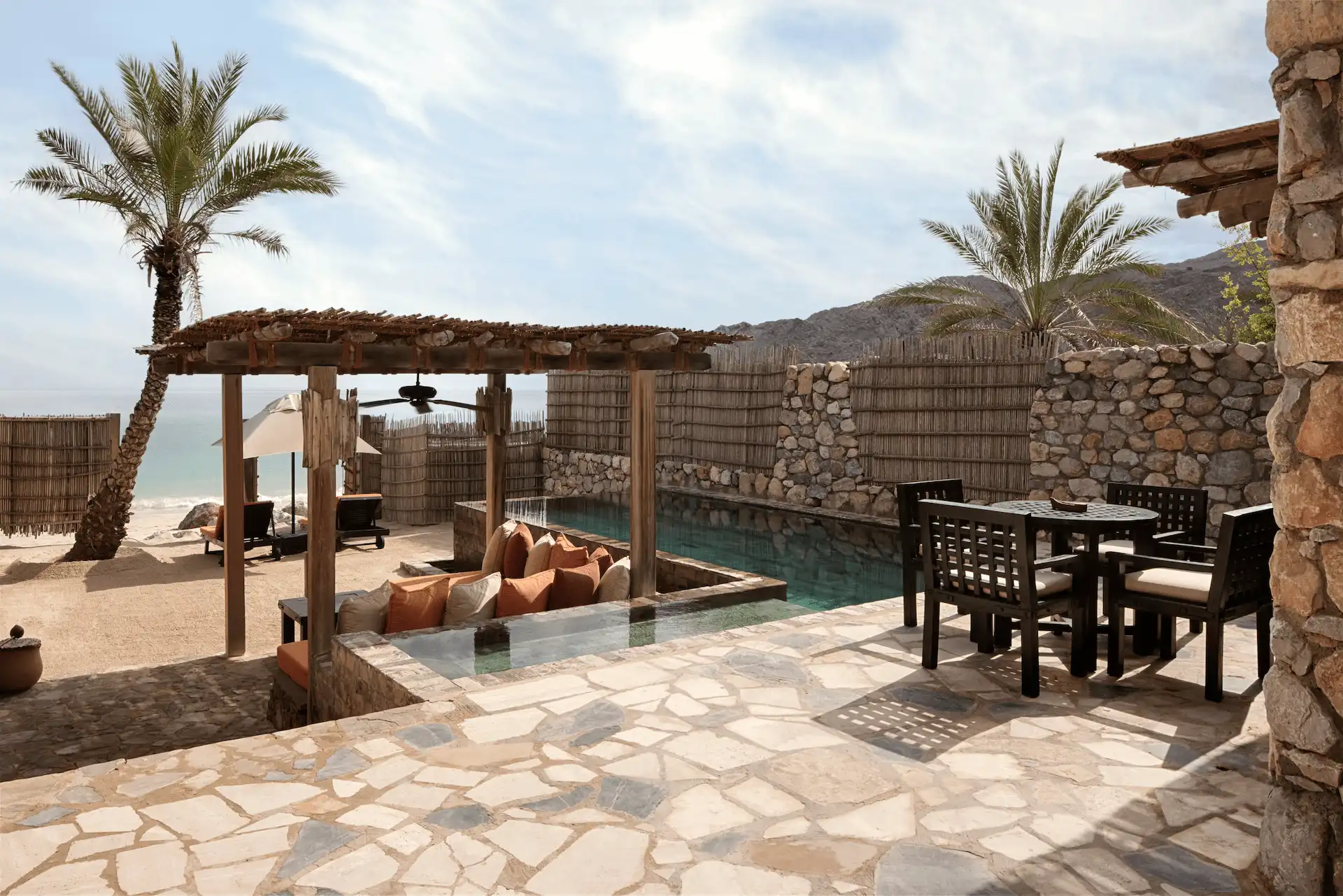 outside view of pool villa beachfront at six senses zighy bay oman